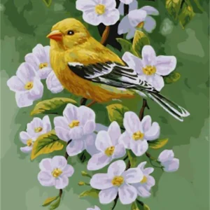 Pájaro en una rama floreciendo